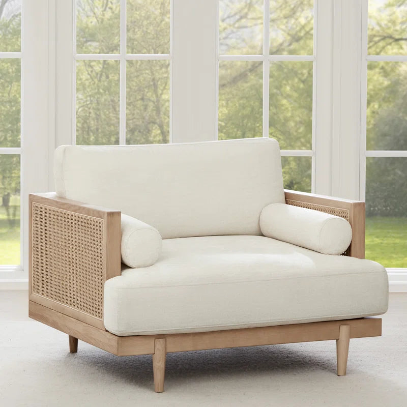 Elevate Your Space with the Ahlea Coastal-Inspired Natural Cane Upholstered Armchair